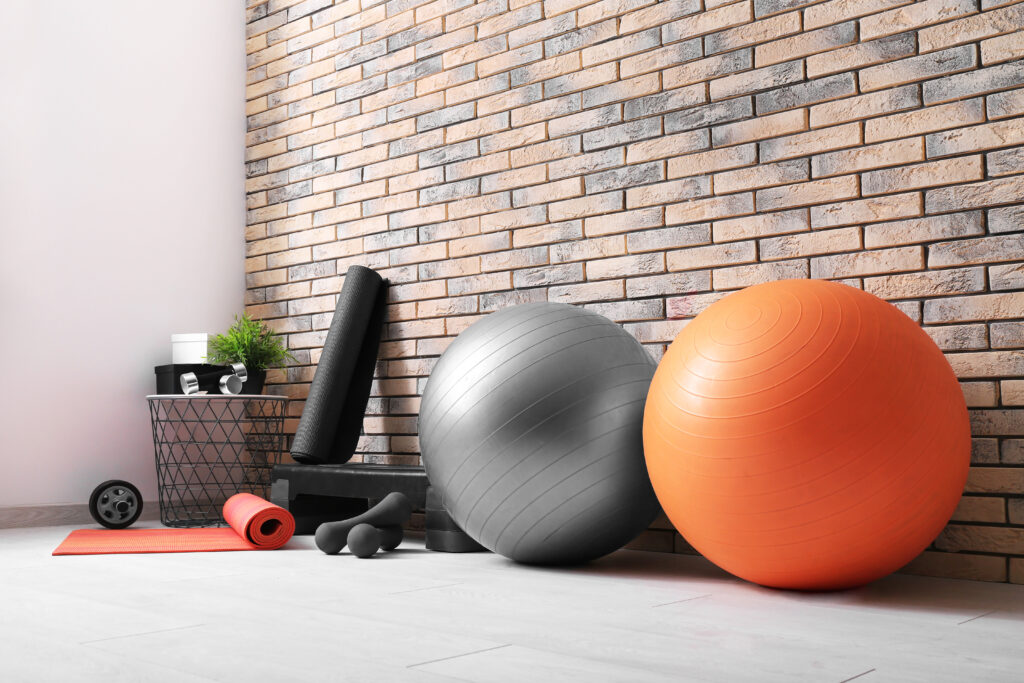 Different physiotherapy equipment in room