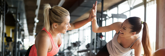 Beautiful women working out in gym