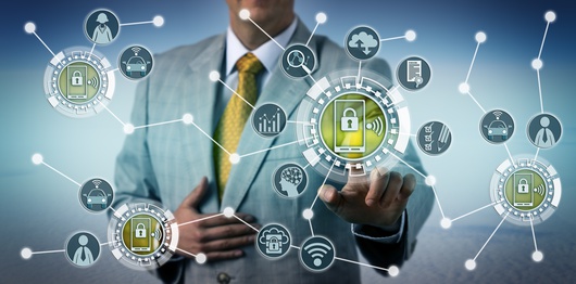 Executive Using Smartphone Telematics On Drivers